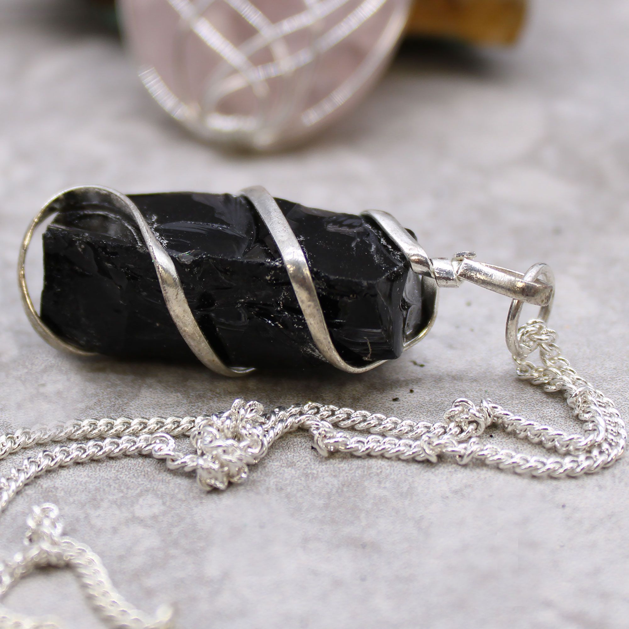 bG9jYWw6Ly9tZWRpYS8xSy84RS82MFIzMEMxRzZSVks4RTFLLzBlYzQzZGJhLmpwZWc-1.jpg Cascade Wrapped Gemstone Necklace - Rough Black Onyx - Image 1